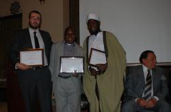 Imam Ashafa, Pastor James and Dr Karam show their certificate of appreciation from the American University of Cairo on 2 June, 2009